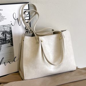 bright gold purse with chain